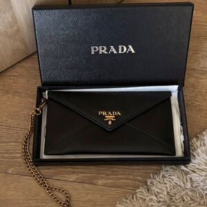 Prada Black Leather Clutch with Gold Accent